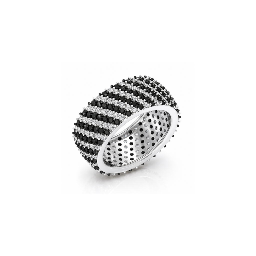 Silver ring with black gemstones on a white background