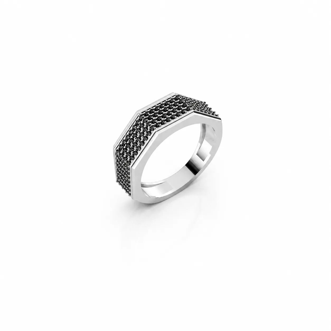 Silver ring with black gemstones on a white background