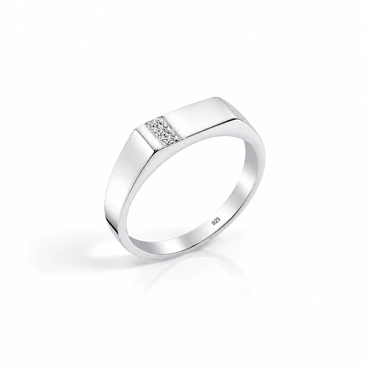 Silver ring with a diamond on a white background