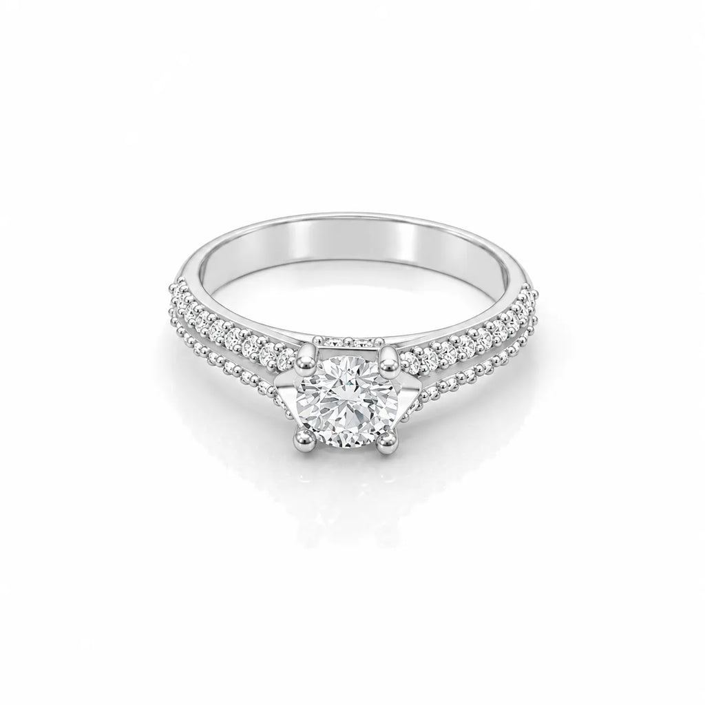 Closeup of pavé band solitaire engagement ring