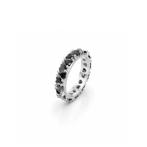 Gold eternity band ring with ruby red round stones
